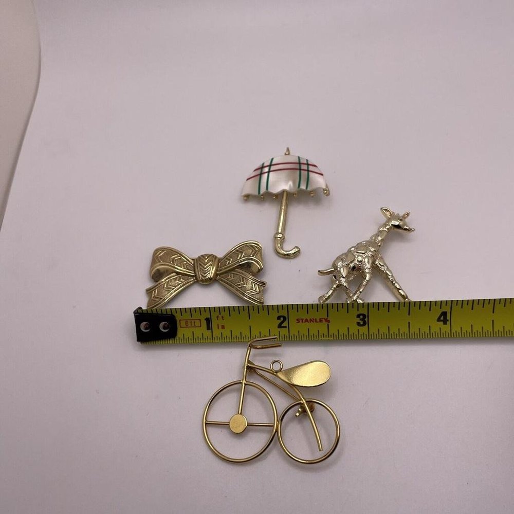 Lot Of 4 Women’s Gold Tone Brooch Pins Metal Bike, Giraffe, Umbrella, Bow - Picture 6 of 11